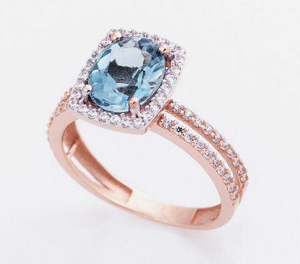 Золотое кольцо с голубым топазом и фианитами.jpg