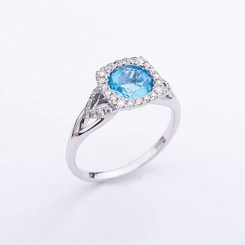 Золотое кольцо с голубым топазом и бриллиантами от ювелирного магазина Оникс