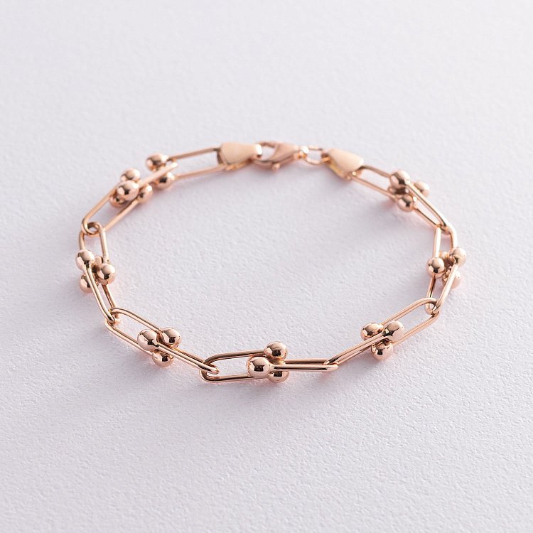 Браслет "Фантазія" в червоному золоті б04704 від ювелірного магазину Онікс