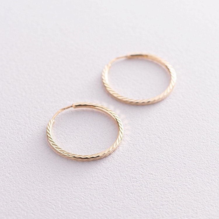 Сережки - кільця в жовтому золоті (2.4 см) с07186 від ювелірного магазину Онікс - 2