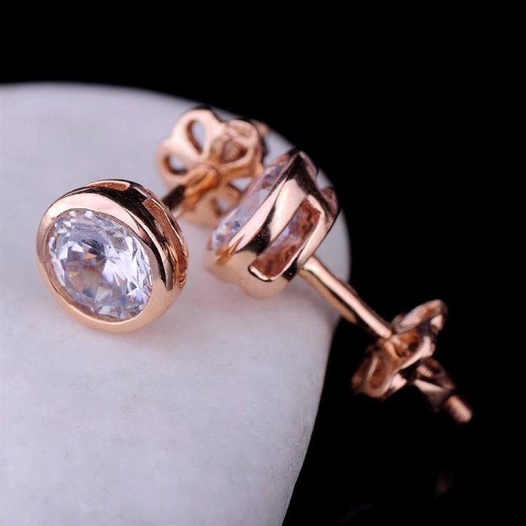 Золоті сережки-пусети з фіанітами с02063 від ювелірного магазину Онікс - 1