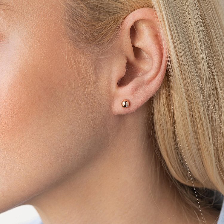 Золотые серьги - пусеты "Шарики" 580079 от ювелирного магазина Оникс