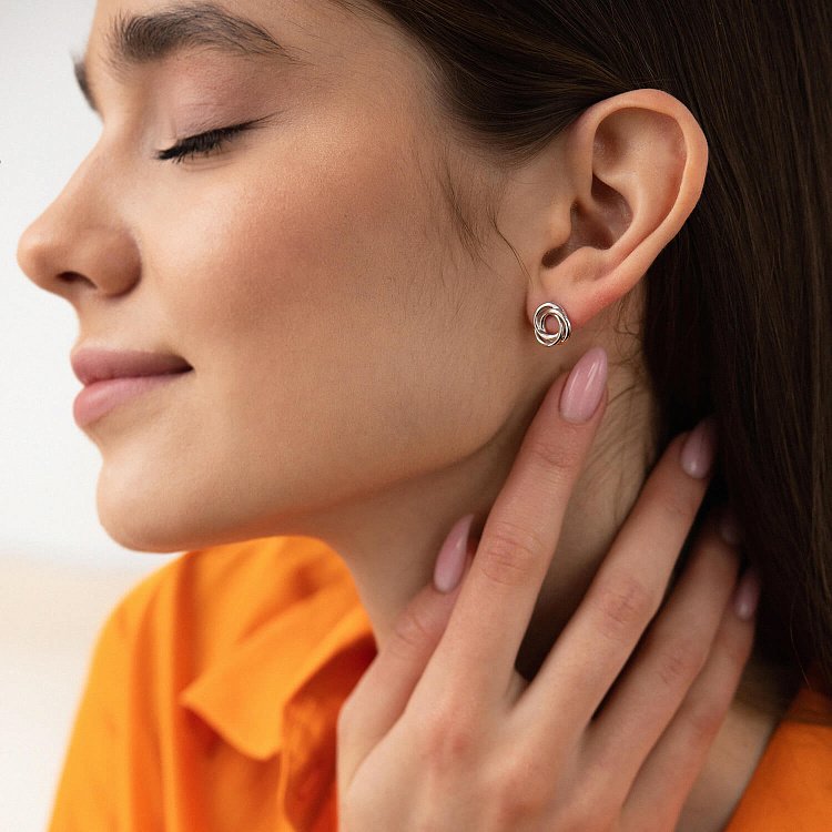 Сережки - пусети "Захоплення" в білому золоті с06911 від ювелірного магазину Онікс - 1