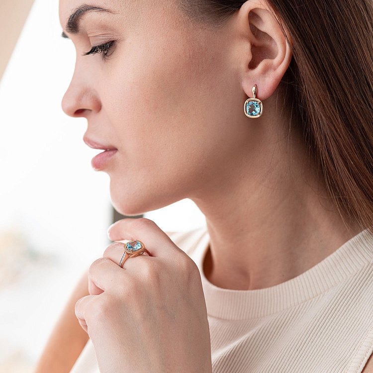 Золотые серьги с голубым топазом с05156 от ювелирного магазина Оникс - 1