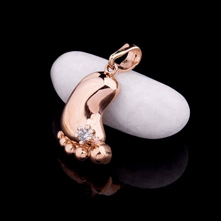 Золота підвіска "Ніжка немовляти" з фіанітом п01922 від ювелірного магазину Онікс