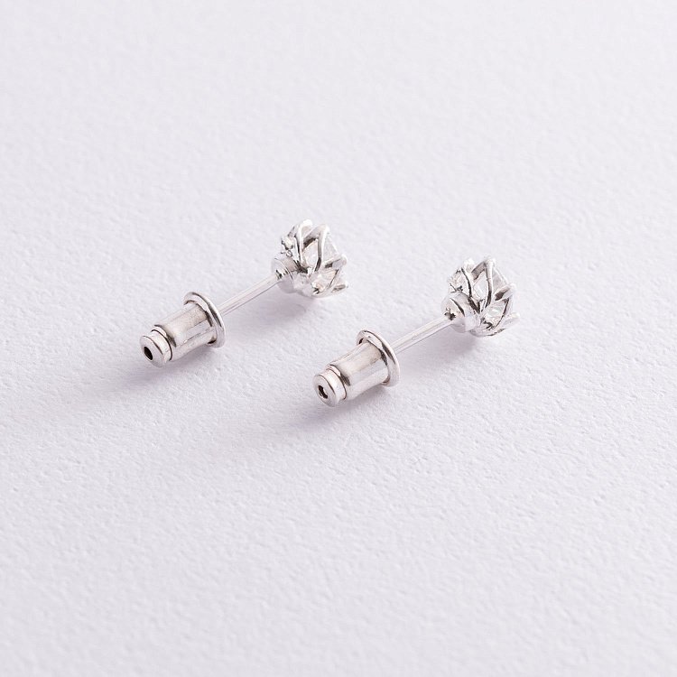 Срібні сережки - пусети з фіанітами 121900 від ювелірного магазину Онікс