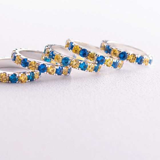 Серебряное кольцо с дорожкой голубых и желтых камней 112664 №5