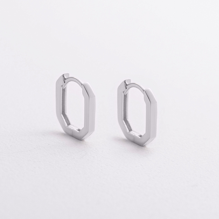 Серьги "Olimpia" в белом золоте с09397 от ювелирного магазина Оникс