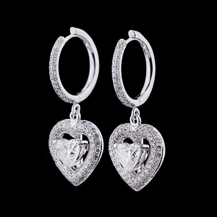 Золоті сережки "Серця" з діамантами Е009в від ювелірного магазину Онікс - 1