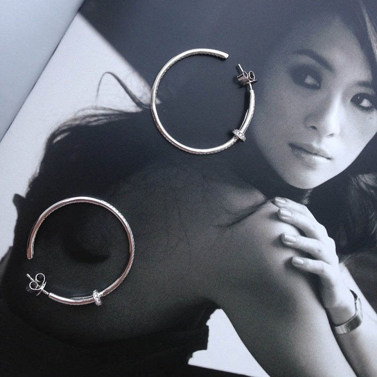 Срібні сережки "Цвяшки" з фіанітами 121749 від ювелірного магазину Онікс - 1