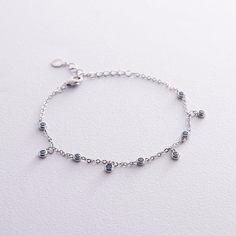 Срібне кольє з блакитними фіанітами 141638 від ювелірного магазину Онікс