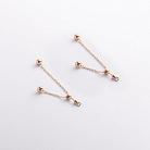 Серьги - пусеты с шариками на цепочке (желтое золото) 580142м от ювелирного магазина Оникс - 2