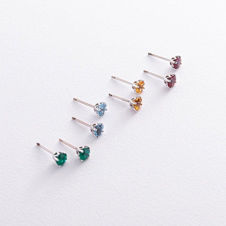 Золотые серьги - пусеты с голубыми топазами с08410 от ювелирного магазина Оникс - 2