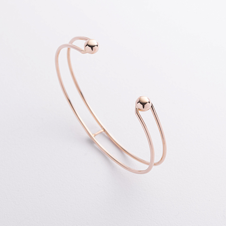 Жорсткий браслет "Marlene" з кульками (жовте золото) б05603 від ювелірного магазину Онікс