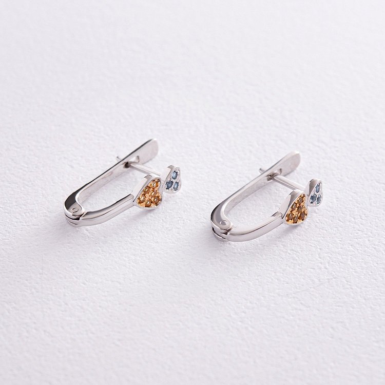 Срібні сережки "Сердечки" (блакитні та жовті камені) 704 від ювелірного магазину Онікс - 2