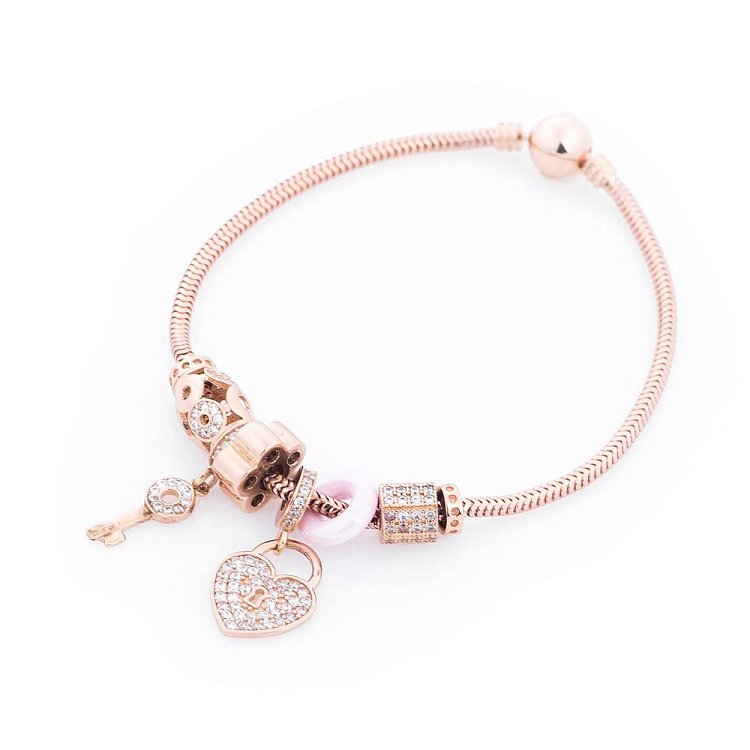 Золотой браслет с подвесками б02739р от ювелирного магазина Оникс