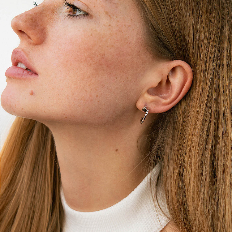 Сережки - пусети "Цвях" у білому золоті (фіаніти) с09173 від ювелірного магазину Онікс - 1