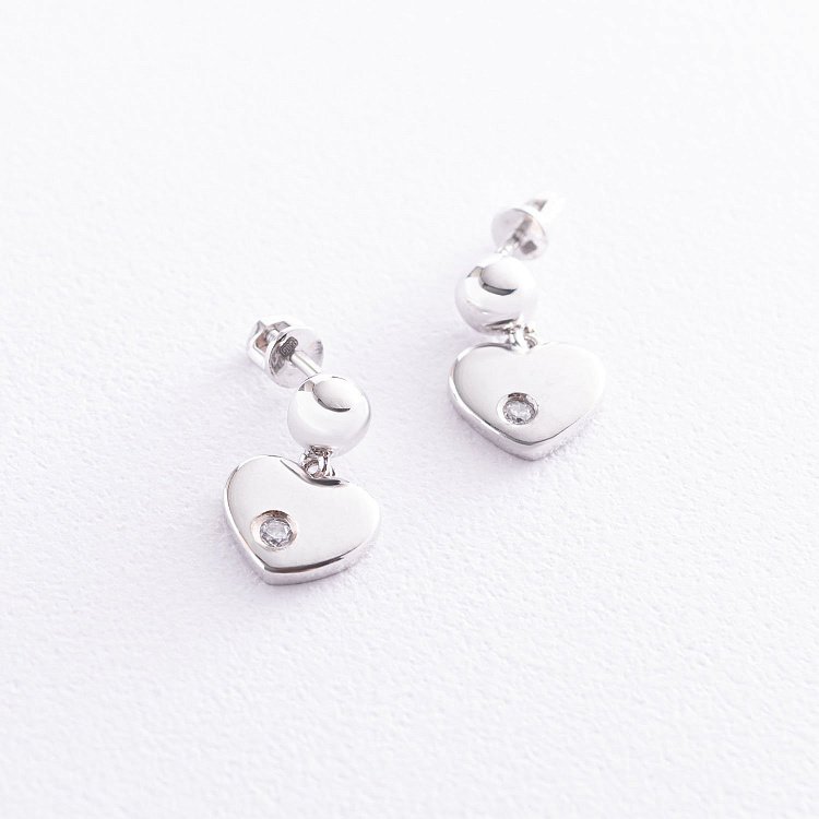 Золоті сережки - пусети "Сердечка" з фіанітами с07015 від ювелірного магазину Онікс - 1