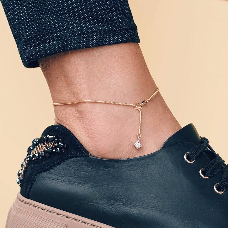 Золотий браслет на ногу з фіанітом б00599 від ювелірного магазину Онікс