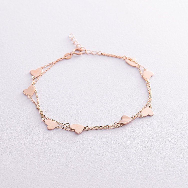 Подвійний золотий браслет "Сердечки" б05114 від ювелірного магазину Онікс