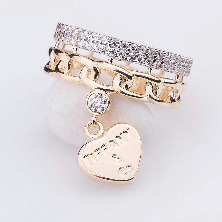 Золота каблучка з фіанітами к04275 від ювелірного магазину Онікс