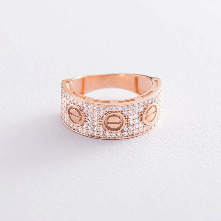 Золота каблучка з фіанітами к05225 Золота каблучка з фіанітами к05225 від ювелірного магазину Онікс