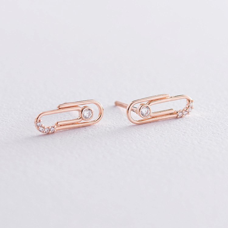 Золотые серьги - пусеты "Скрепки" (фианит) с06866 от ювелирного магазина Оникс