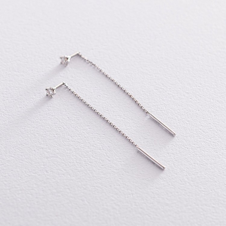 Сережки - протяжки в білому золоті (діаманти) 102-10086 від ювелірного магазину Онікс