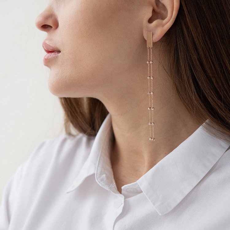 Золотые висячие серьги с шариками 480072 от ювелирного магазина Оникс