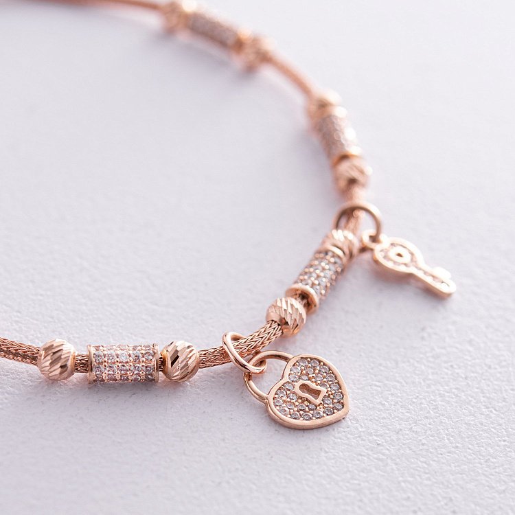 Золотой браслет "Сердечко с ключиком" (фианит) б04007 от ювелирного магазина Оникс - 2