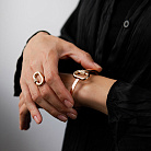 Жесткий браслет "Alice" в красном золоте (фианиты) б05734 от ювелирного магазина Оникс - 1