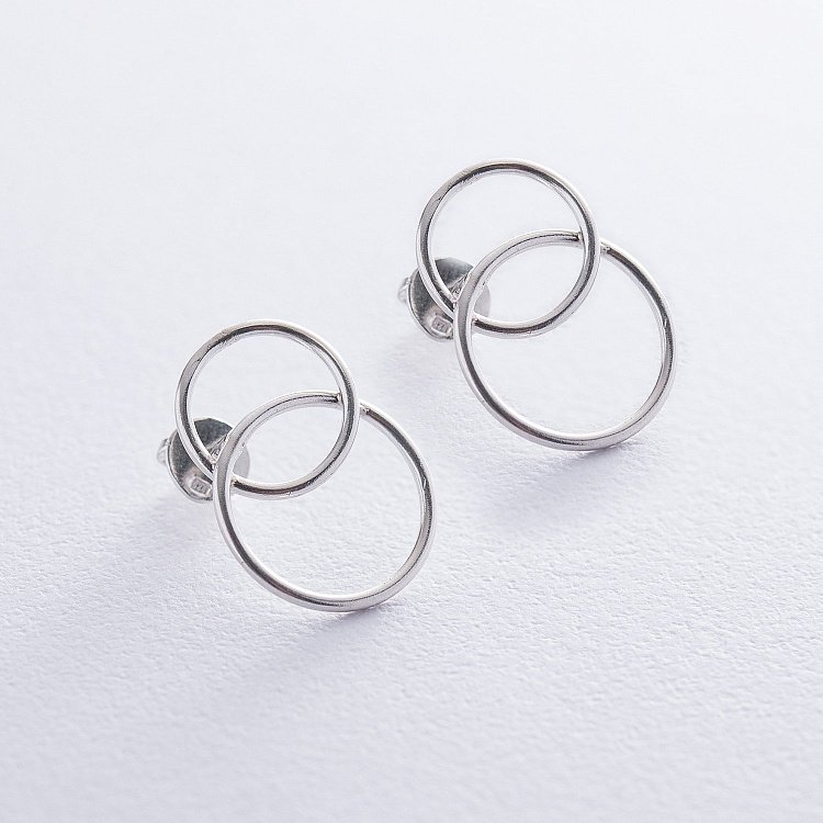 Срібні сережки - пусети "Перетин кілець" 122584 від ювелірного магазину Онікс - 2