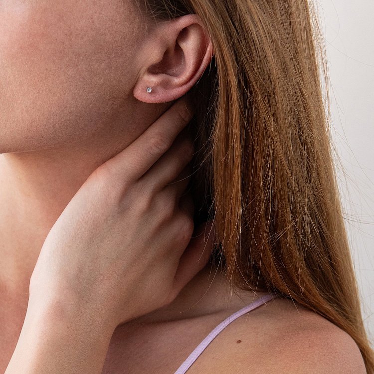 Золоті сережки - пус﻿ети з діамантами 102-10025 від ювелірного магазину Онікс - 1