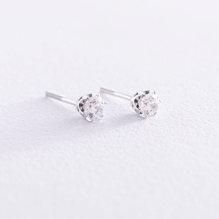 Золотые серьги-пусеты с фианитами (0.5 см) с07016 от ювелирного магазина Оникс