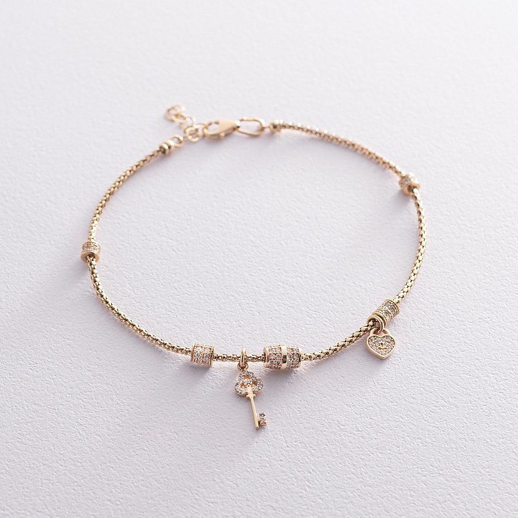 Золотий браслет з фіанітами б04013 від ювелірного магазину Онікс