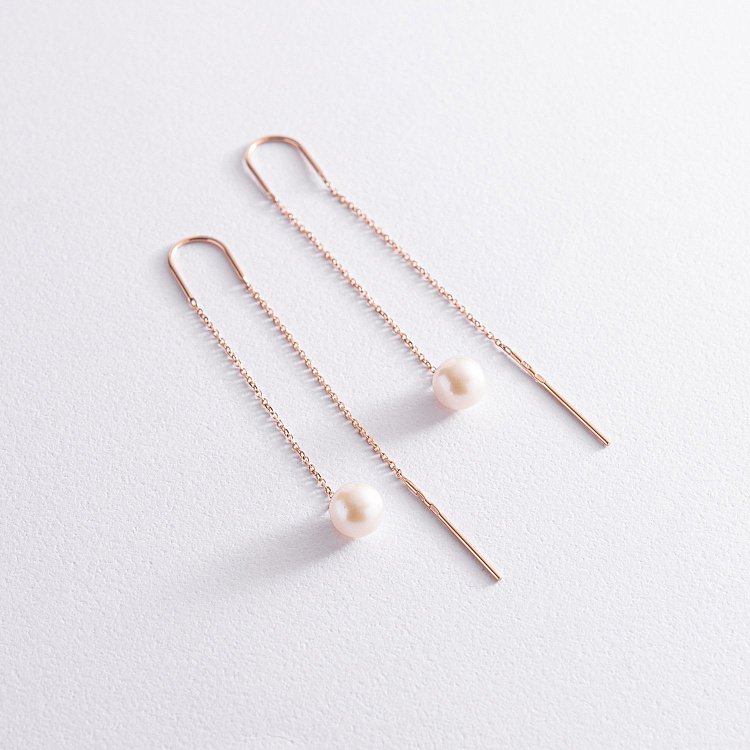 Золотые серьги - протяжки с жемчугом 580035 от ювелирного магазина Оникс