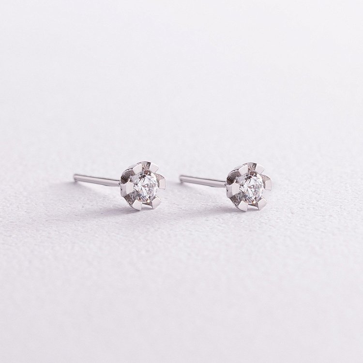 Золотые серьги - пусеты с фианитами с05849 от ювелирного магазина Оникс