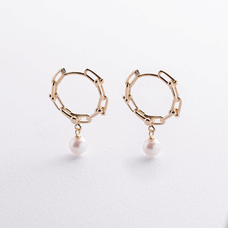 Сережки - кільця "Фантазія" з перлами (жовте золото) mini с09628 від ювелірного магазину Онікс