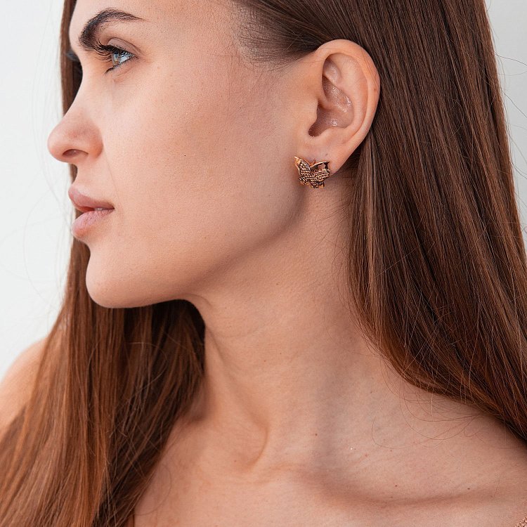 Золоті сережки "Метелики" з фіанітами с05536 від ювелірного магазину Онікс - 1