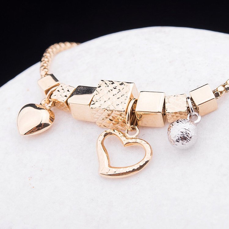 Ексклюзивний золотий браслет з серцями і кулею б02220 від ювелірного магазину Онікс - 3