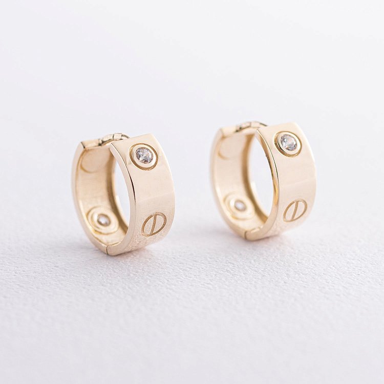 Сережки - кільця "Love" в жовтому золоті (фіаніти) с07214 від ювелірного магазину Онікс