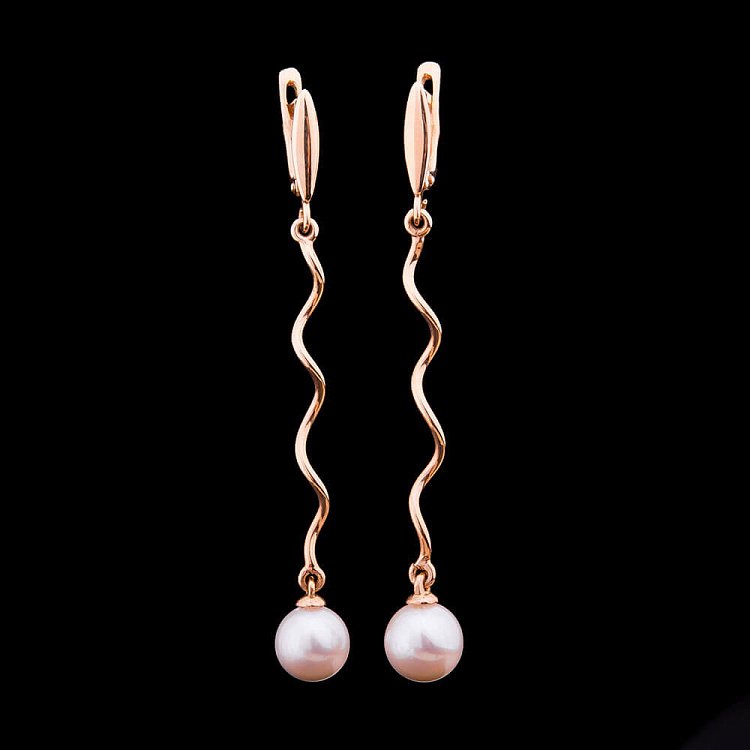 Золотые серьги с жемчугом с01774 Золотые серьги с жемчугом с01774 от ювелирного магазина Оникс