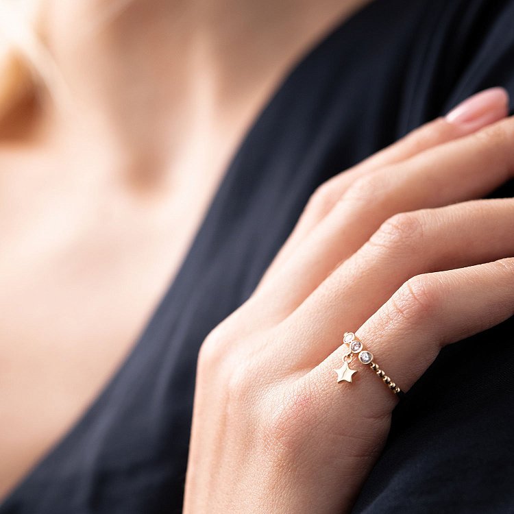 Золота каблучка "Зірочка" з фіанітами к06817 від ювелірного магазину Онікс - 2