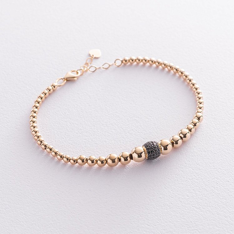 Браслет "Кульки" в жовтому золоті (чорні фіаніти) б04651 від ювелірного магазину Онікс