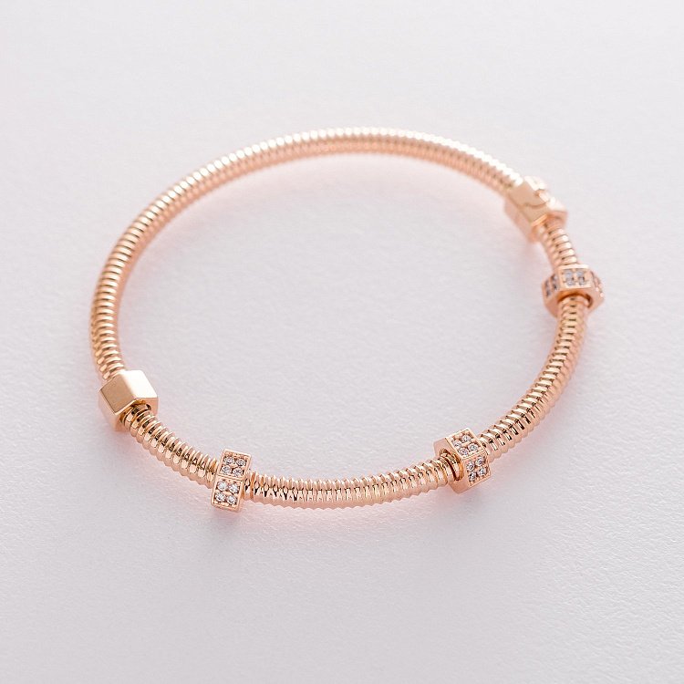 Жесткий золотой браслет с фианитами б04192 от ювелирного магазина Оникс