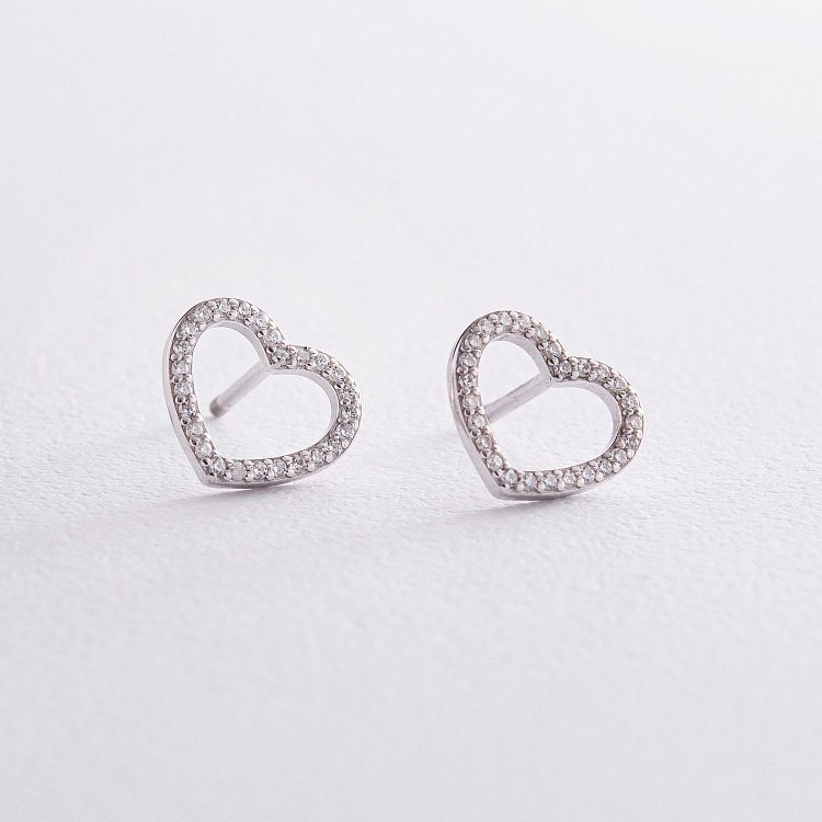 Серебряные серьги - пусеты "Сердечки" с фианитами OR121210 от ювелирного магазина Оникс