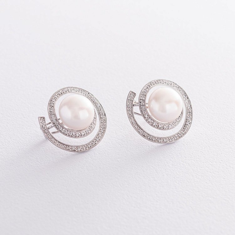 Золотые серьги "Круговорот" с бриллиантами и жемчугом c1021 от ювелирного магазина Оникс