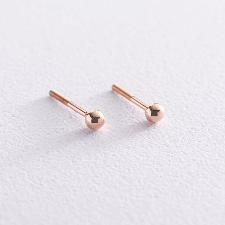 Сережки - пусети "Кульки" в червоному золоті (0.4 см) с07291 від ювелірного магазину Онікс