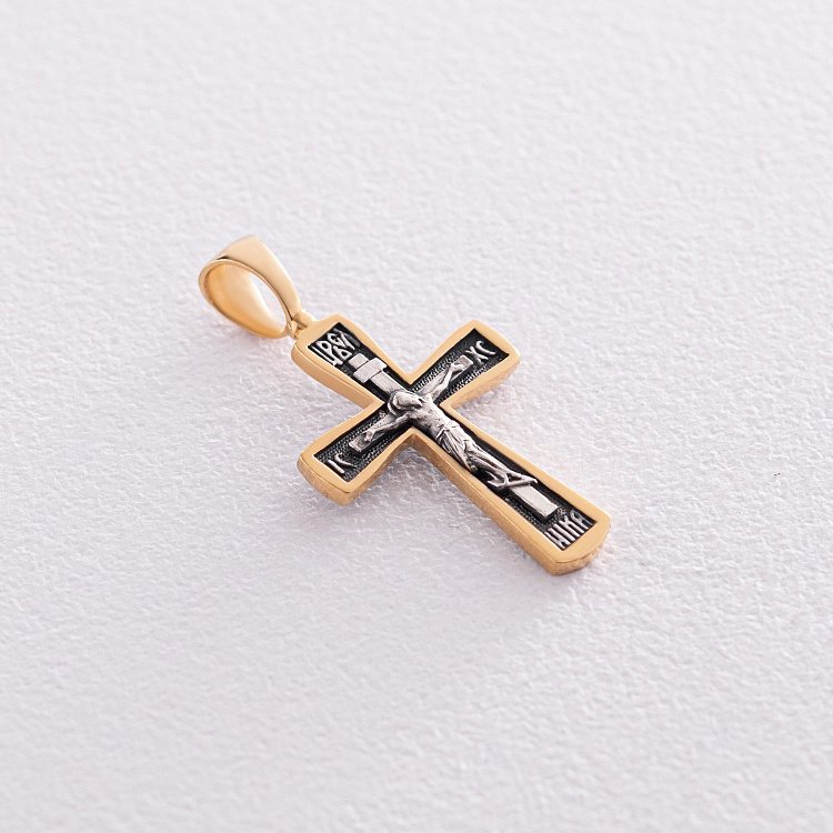 Срібний хрестик з позолотою 132462 від ювелірного магазину Онікс