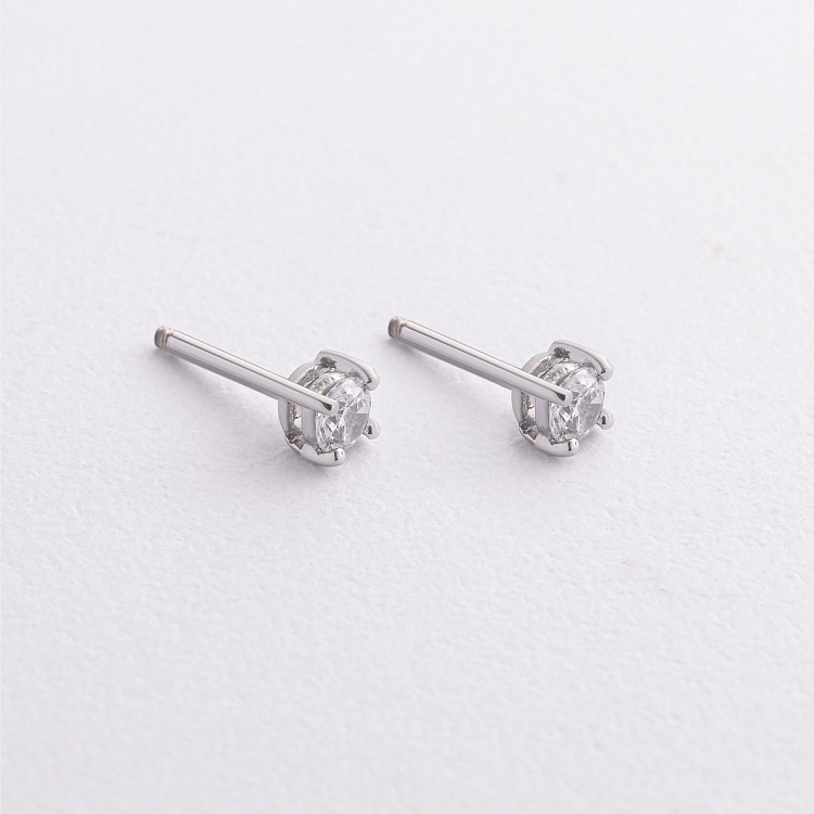 Серебряные серьги - пусеты с фианитами 123331 от ювелирного магазина Оникс